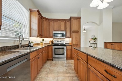 Welcome to your dream home in the highly sought-after Halifax on Halifax Plantation Golf Club in Florida - for sale on GolfHomes.com, golf home, golf lot