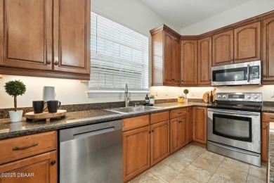 Welcome to your dream home in the highly sought-after Halifax on Halifax Plantation Golf Club in Florida - for sale on GolfHomes.com, golf home, golf lot