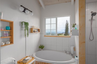 Discover the perfect blend of modern upgrades and island living on Discovery Harbour Golf Course in Hawaii - for sale on GolfHomes.com, golf home, golf lot