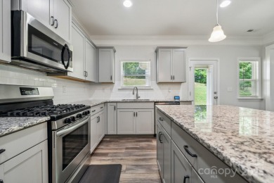 Discover this stunning 4 bedroom, 2.5-bathroom home in the on Cramer Mountain Country Club in North Carolina - for sale on GolfHomes.com, golf home, golf lot