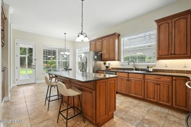 Welcome to your dream home in the highly sought-after Halifax on Halifax Plantation Golf Club in Florida - for sale on GolfHomes.com, golf home, golf lot