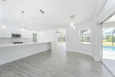 Welcome to this stunning, FULLY REMODELED home located in the on Rotonda Golf and Country Club - Long Marsh  in Florida - for sale on GolfHomes.com, golf home, golf lot