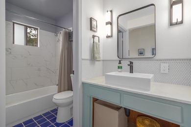 Discover the perfect blend of modern upgrades and island living on Discovery Harbour Golf Course in Hawaii - for sale on GolfHomes.com, golf home, golf lot