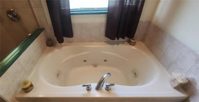 Discover Unparalleled Privacy and Spacious Living in Sebring's on Sun n Lake Golf and Country Club in Florida - for sale on GolfHomes.com, golf home, golf lot