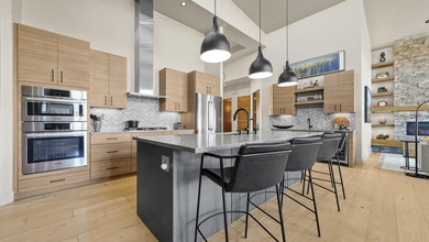 This modern masterpiece, built in 2020, offers the perfect blend on The Golf Club At Redlands Mesa in Colorado - for sale on GolfHomes.com, golf home, golf lot