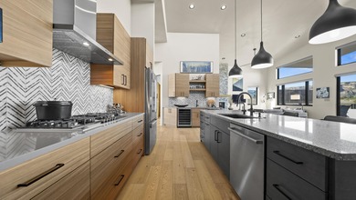 This modern masterpiece, built in 2020, offers the perfect blend on The Golf Club At Redlands Mesa in Colorado - for sale on GolfHomes.com, golf home, golf lot