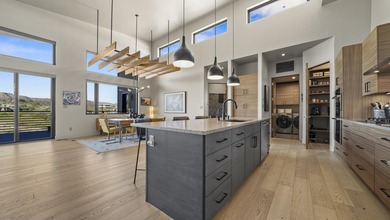 This modern masterpiece, built in 2020, offers the perfect blend on The Golf Club At Redlands Mesa in Colorado - for sale on GolfHomes.com, golf home, golf lot
