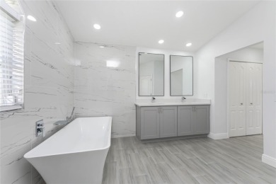 Welcome to this stunning, FULLY REMODELED home located in the on Rotonda Golf and Country Club - Long Marsh  in Florida - for sale on GolfHomes.com, golf home, golf lot
