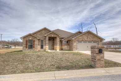 Just in time for golf and pool season, this beautifully on Briarbrook Golf Course in Missouri - for sale on GolfHomes.com, golf home, golf lot