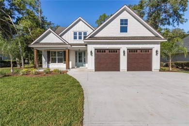 MOVE IN READY! This stunning two-story home by local builder on Laurel Island Links in Georgia - for sale on GolfHomes.com, golf home, golf lot