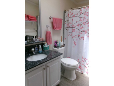 This lakefront beauty is loving maintained and super clean. With on Tomoka Oaks Golf and Country Club in Florida - for sale on GolfHomes.com, golf home, golf lot