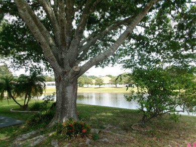 This lakefront beauty is loving maintained and super clean. With on Tomoka Oaks Golf and Country Club in Florida - for sale on GolfHomes.com, golf home, golf lot