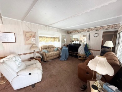 FULLY FURNISHED!! Bring offers.... This home is located in a 55+ on Lone Palm Golf Club in Florida - for sale on GolfHomes.com, golf home, golf lot