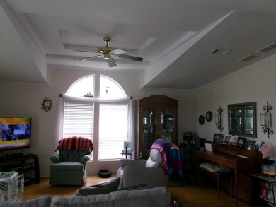This lakefront beauty is loving maintained and super clean. With on Tomoka Oaks Golf and Country Club in Florida - for sale on GolfHomes.com, golf home, golf lot