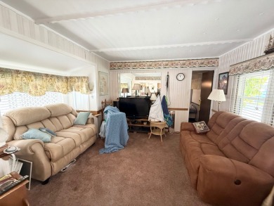 FULLY FURNISHED!! Bring offers.... This home is located in a 55+ on Lone Palm Golf Club in Florida - for sale on GolfHomes.com, golf home, golf lot