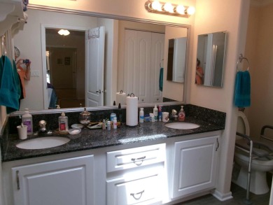 This lakefront beauty is loving maintained and super clean. With on Tomoka Oaks Golf and Country Club in Florida - for sale on GolfHomes.com, golf home, golf lot