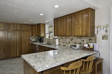 Spacious and beautifully positioned, this 3-bedroom, 2.5-bath on Lake Shastina Golf Course in California - for sale on GolfHomes.com, golf home, golf lot