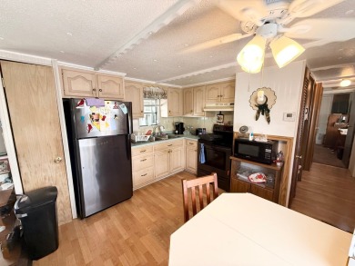 FULLY FURNISHED!! Bring offers.... This home is located in a 55+ on Lone Palm Golf Club in Florida - for sale on GolfHomes.com, golf home, golf lot