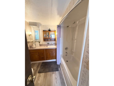 FULLY FURNISHED!! Bring offers.... This home is located in a 55+ on Lone Palm Golf Club in Florida - for sale on GolfHomes.com, golf home, golf lot