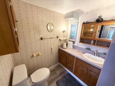 FULLY FURNISHED!! Bring offers.... This home is located in a 55+ on Lone Palm Golf Club in Florida - for sale on GolfHomes.com, golf home, golf lot