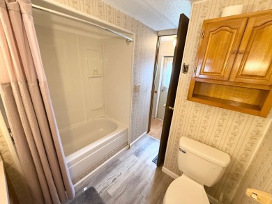 FULLY FURNISHED!! Bring offers.... This home is located in a 55+ on Lone Palm Golf Club in Florida - for sale on GolfHomes.com, golf home, golf lot