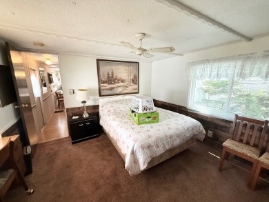 FULLY FURNISHED!! Bring offers.... This home is located in a 55+ on Lone Palm Golf Club in Florida - for sale on GolfHomes.com, golf home, golf lot