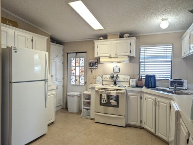 Listed by the Official Sales Team of Cypress Lakes Village on Big Cypress Golf and Country Club in Florida - for sale on GolfHomes.com, golf home, golf lot