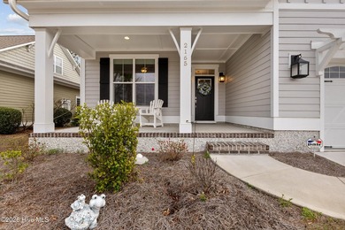 Welcome to 2165 Palm Pointe NE, a beautiful Bill Clark Legacy on Compass Pointe Golf Course in North Carolina - for sale on GolfHomes.com, golf home, golf lot