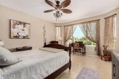Exceptional Golf Course Home with Private Pool  Designer Kitchen on Poston Butte Golf Club in Arizona - for sale on GolfHomes.com, golf home, golf lot