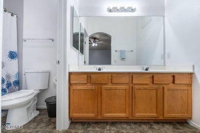 Located within the sought-after Augusta Ranch golf community on Augusta Ranch Golf Club in Arizona - for sale on GolfHomes.com, golf home, golf lot