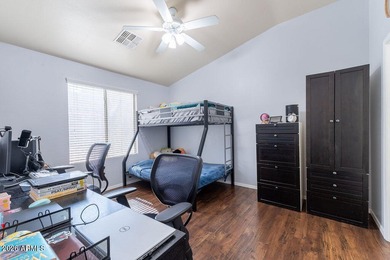 Located within the sought-after Augusta Ranch golf community on Augusta Ranch Golf Club in Arizona - for sale on GolfHomes.com, golf home, golf lot