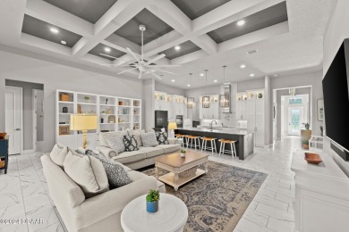 Experience luxury and functionality in this stunning 4-bedroom on Plantation Bay Golf and Country Club in Florida - for sale on GolfHomes.com, golf home, golf lot