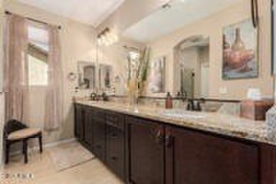 Exceptional Golf Course Home with Private Pool  Designer Kitchen on Poston Butte Golf Club in Arizona - for sale on GolfHomes.com, golf home, golf lot
