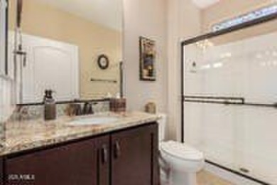 Exceptional Golf Course Home with Private Pool  Designer Kitchen on Poston Butte Golf Club in Arizona - for sale on GolfHomes.com, golf home, golf lot