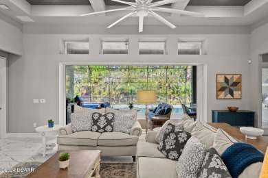 Experience luxury and functionality in this stunning 4-bedroom on Plantation Bay Golf and Country Club in Florida - for sale on GolfHomes.com, golf home, golf lot