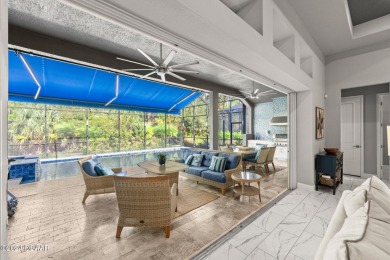 Experience luxury and functionality in this stunning 4-bedroom on Plantation Bay Golf and Country Club in Florida - for sale on GolfHomes.com, golf home, golf lot