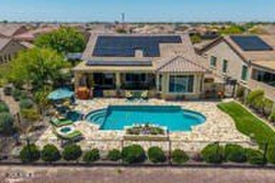 Exceptional Golf Course Home with Private Pool  Designer Kitchen on Poston Butte Golf Club in Arizona - for sale on GolfHomes.com, golf home, golf lot