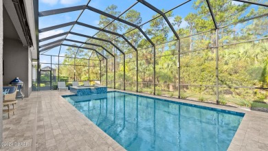 Experience luxury and functionality in this stunning 4-bedroom on Plantation Bay Golf and Country Club in Florida - for sale on GolfHomes.com, golf home, golf lot