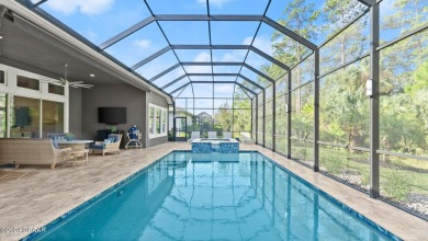 Experience luxury and functionality in this stunning 4-bedroom on Plantation Bay Golf and Country Club in Florida - for sale on GolfHomes.com, golf home, golf lot