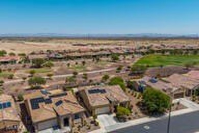 Exceptional Golf Course Home with Private Pool  Designer Kitchen on Poston Butte Golf Club in Arizona - for sale on GolfHomes.com, golf home, golf lot