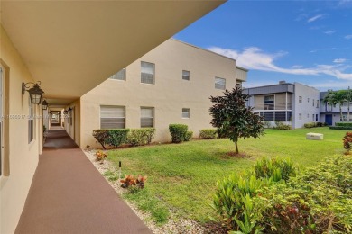 Beautifully updated 1st-floor 2-bedroom, 2-bath condo in Kings on Kings Point Golf -Flanders Way in Florida - for sale on GolfHomes.com, golf home, golf lot