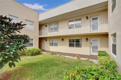 Beautifully updated 1st-floor 2-bedroom, 2-bath condo in Kings on Kings Point Golf -Flanders Way in Florida - for sale on GolfHomes.com, golf home, golf lot