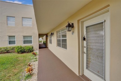 Beautifully updated 1st-floor 2-bedroom, 2-bath condo in Kings on Kings Point Golf -Flanders Way in Florida - for sale on GolfHomes.com, golf home, golf lot