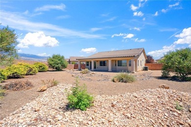 Experience suburban serenity just an hour away from Las Vegas on Mountain Falls Golf Course in Nevada - for sale on GolfHomes.com, golf home, golf lot