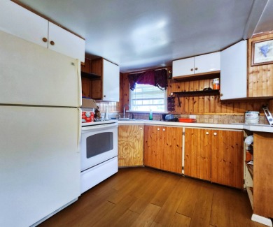 This WATERFRONT home is deemed 100% HABITABLE & ready for on Gulf Harbors Golf Course in Florida - for sale on GolfHomes.com, golf home, golf lot
