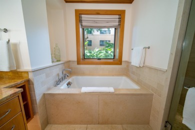 This exquisitely furnished residence offers luxury resort-style on Kapalua Golf Club - Bay Course in Hawaii - for sale on GolfHomes.com, golf home, golf lot