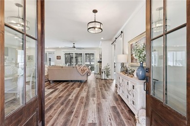 Experience Luxury Low-Country Living in this Beautifully Built on Sapelo Hammock Golf Club in Georgia - for sale on GolfHomes.com, golf home, golf lot