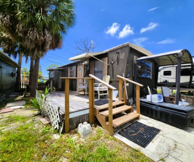 This WATERFRONT home is deemed 100% HABITABLE & ready for on Gulf Harbors Golf Course in Florida - for sale on GolfHomes.com, golf home, golf lot