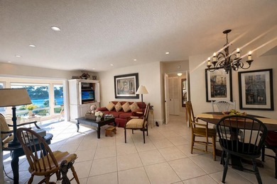 This exceptional two-bedroom, two-bath residence offers refined on The Little Club in Florida - for sale on GolfHomes.com, golf home, golf lot