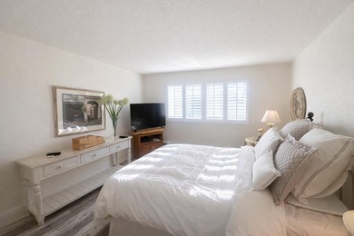 This exceptional two-bedroom, two-bath residence offers refined on The Little Club in Florida - for sale on GolfHomes.com, golf home, golf lot